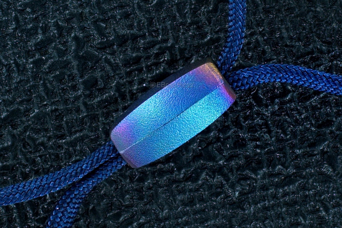 A Pair of Rick Lala (Korth) Hand-ground Titanium Beads