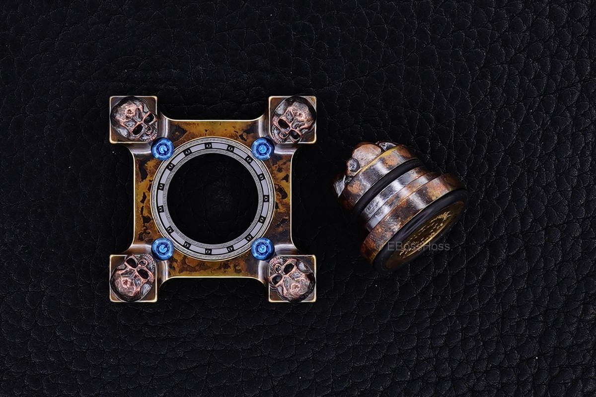 Steel Flame 3-D Copper Pile of Skulls Ring Spin KillBoX