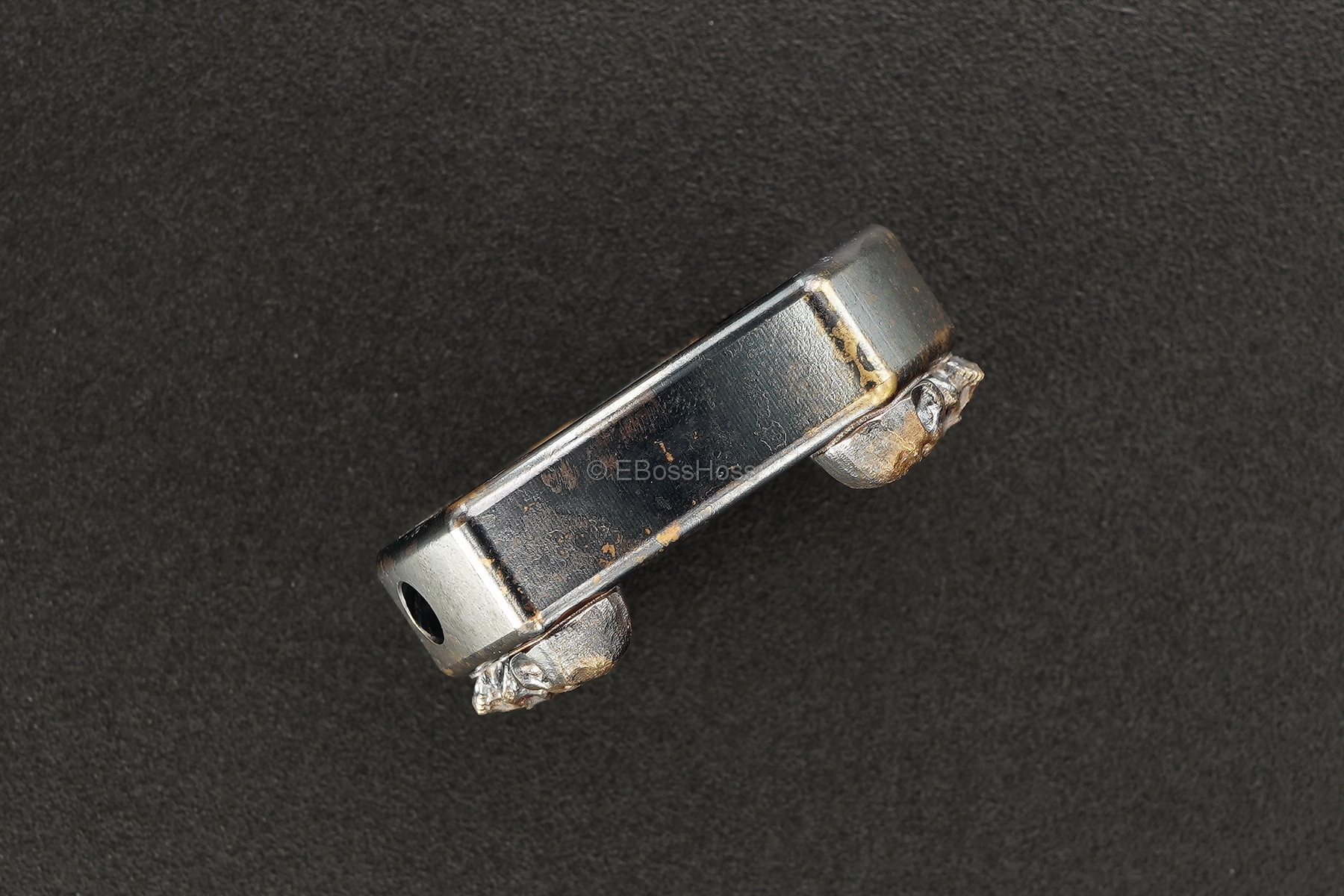 Steel Flame Custom Thick Pile of Skulls Ring