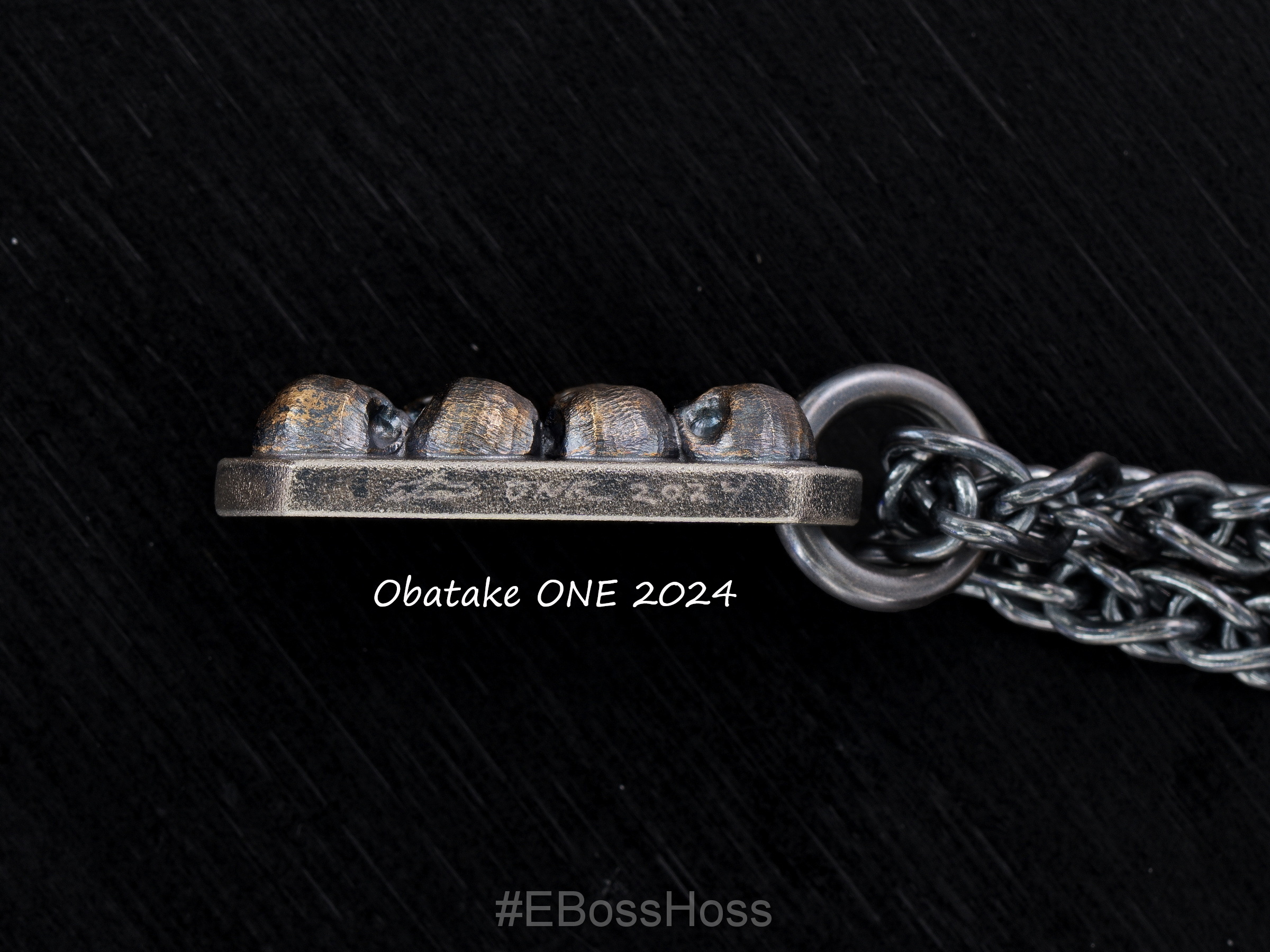 Derrick Obatake - ONE - Custom Vigilant Sterling Silver Pile of Skulls - Talon Necklace